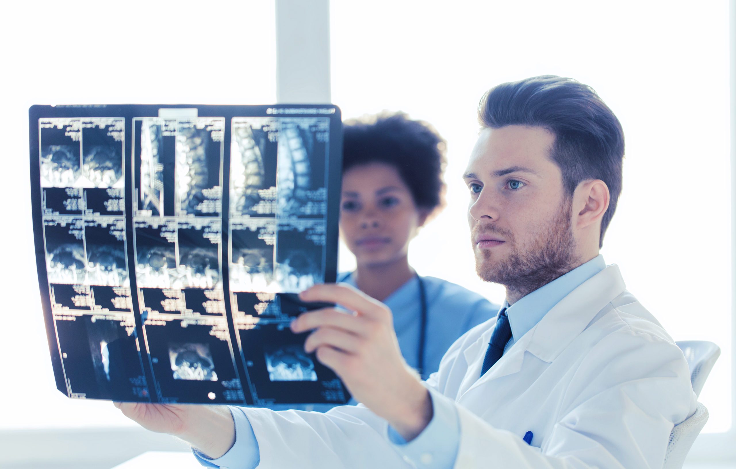 doctor and nurse looking to  x-ray at hospital